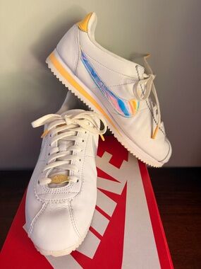 Nike classic Cortez. “White topaz gold” with iridescent swoosh. Size 8. Women